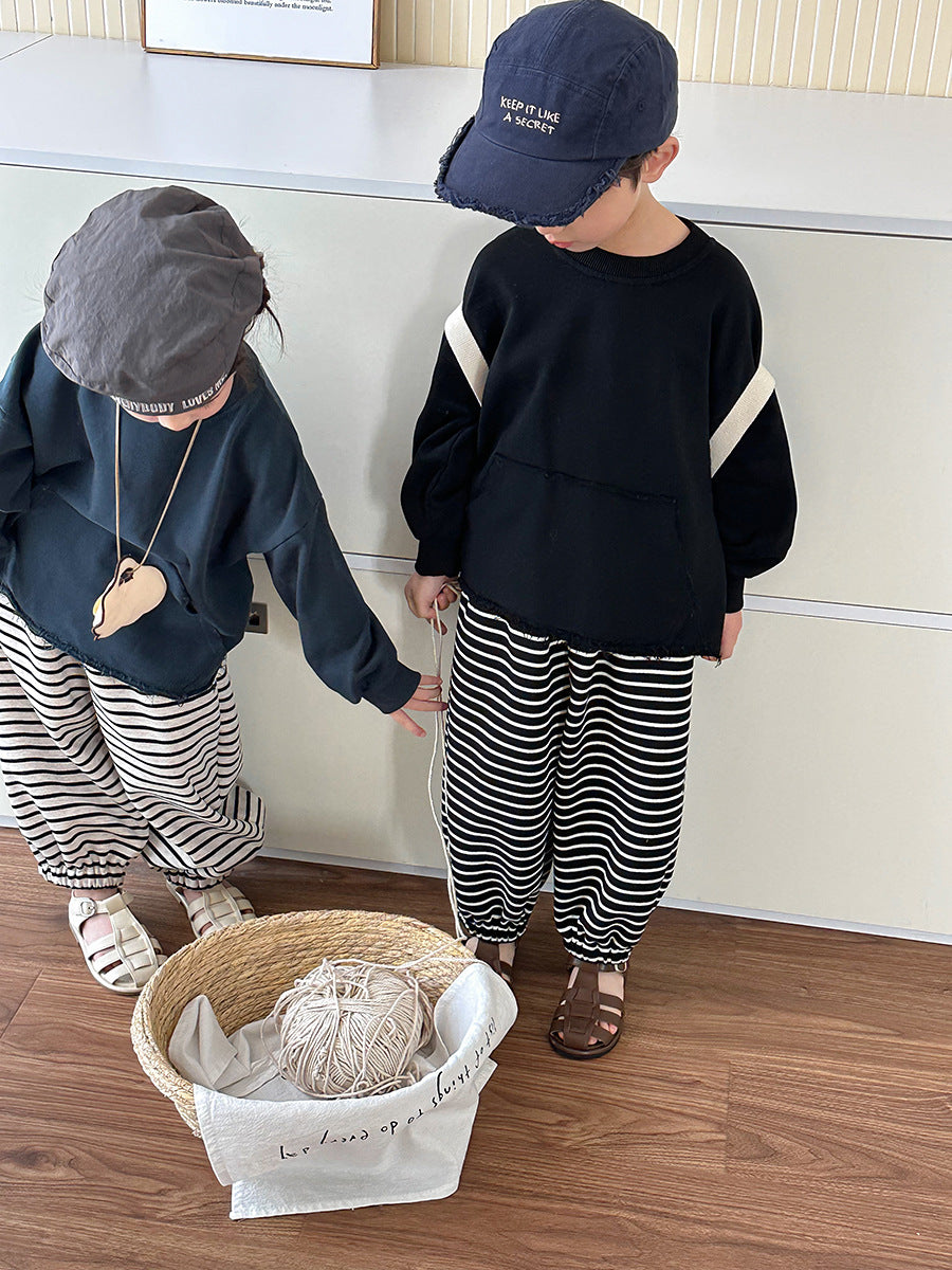 裾フリンジスウェット