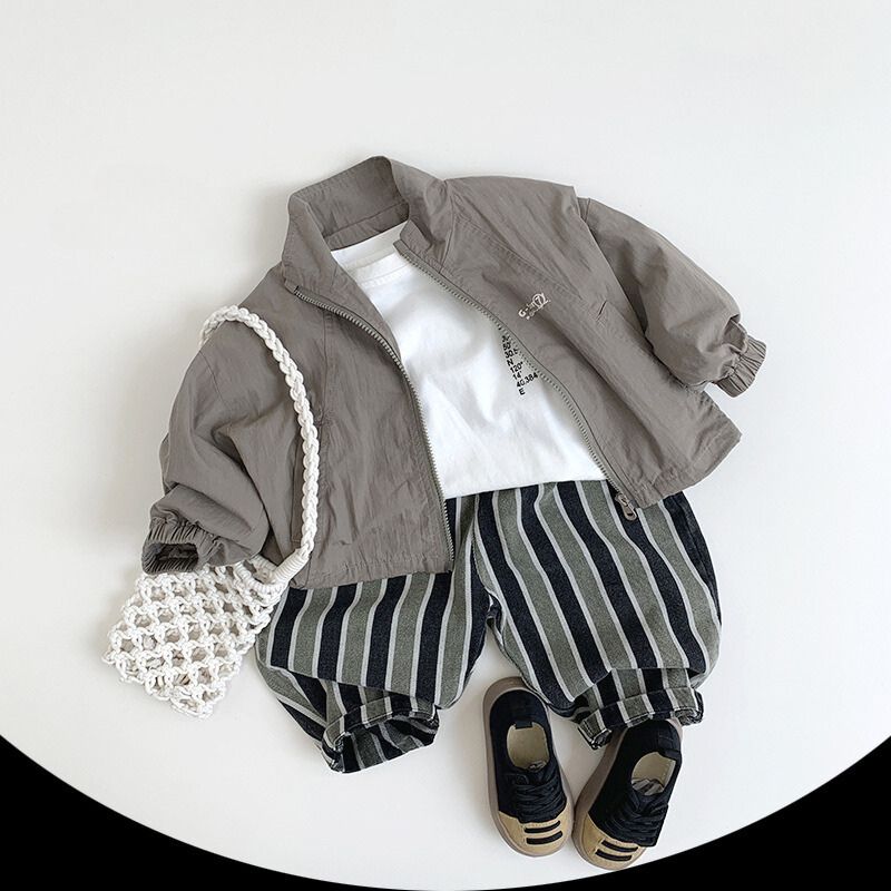 黒x緑ストライプ柄パンツ