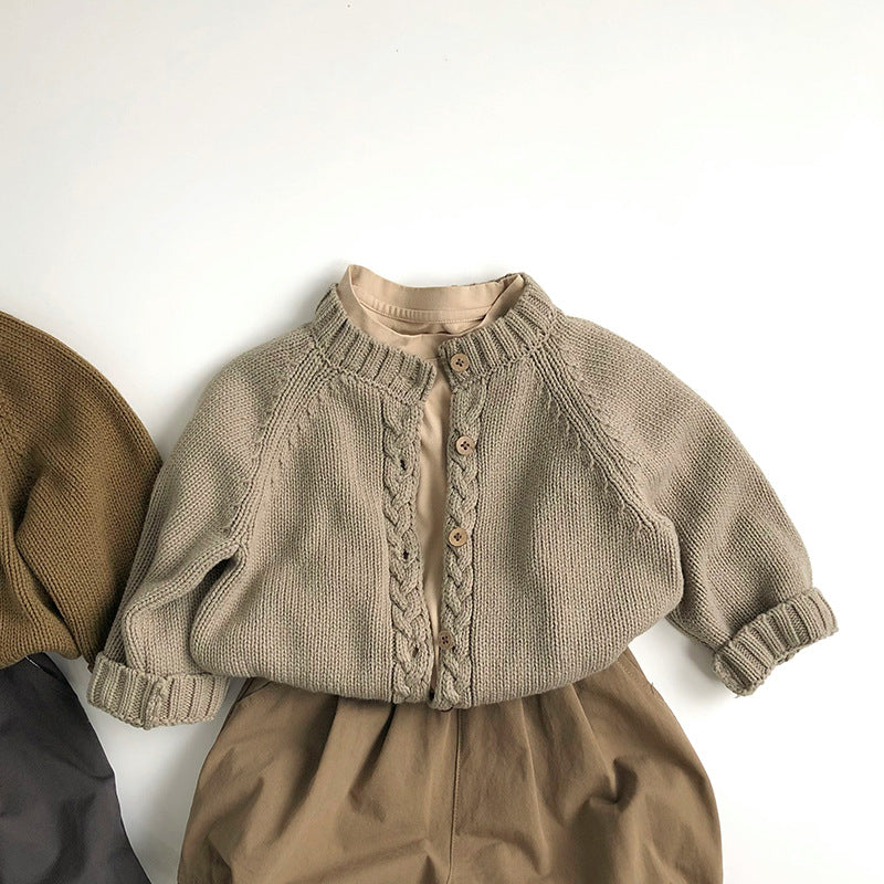 前立てケーブル編みニットカーディガン