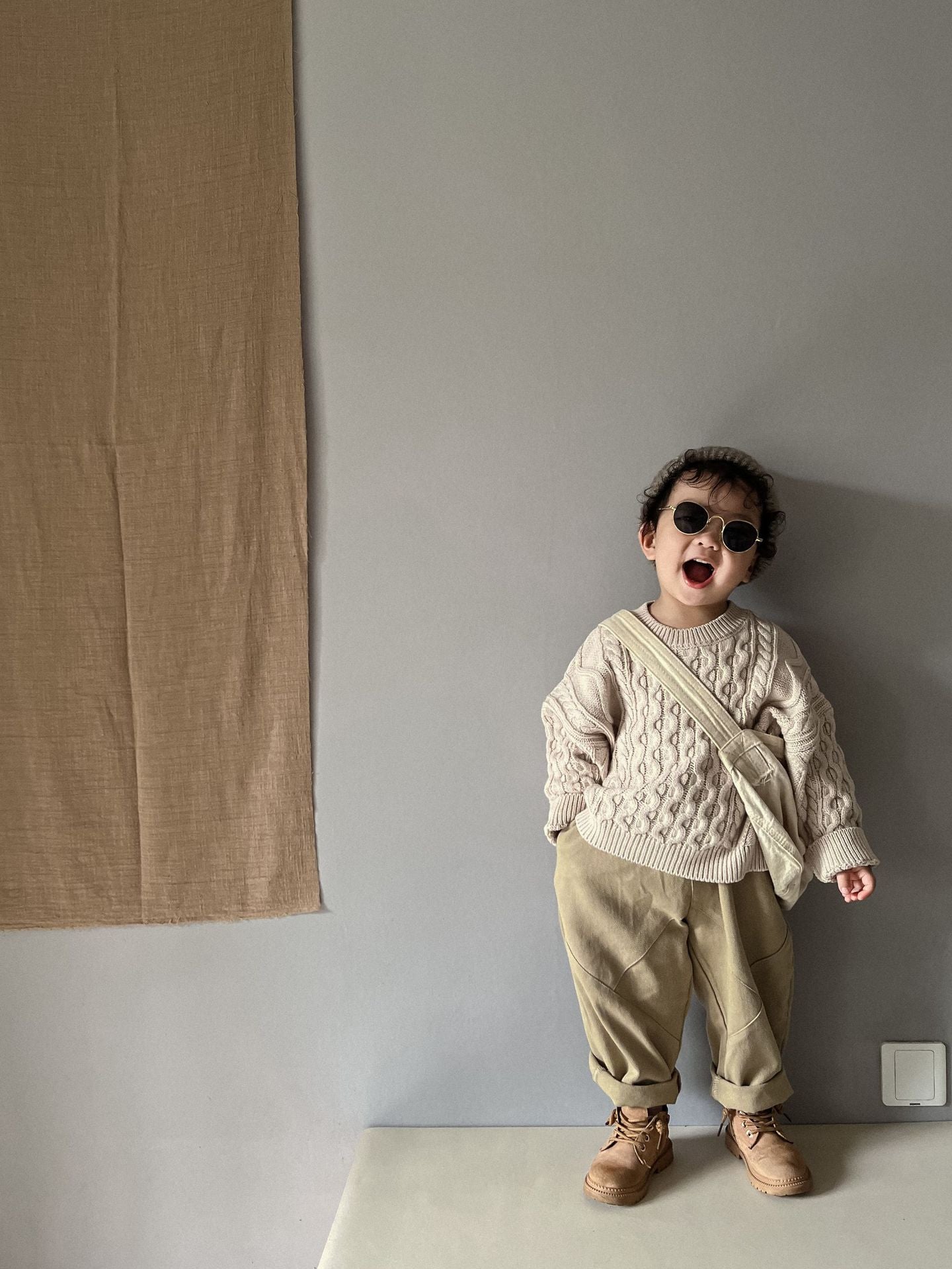 ケーブル編みプルオーバー