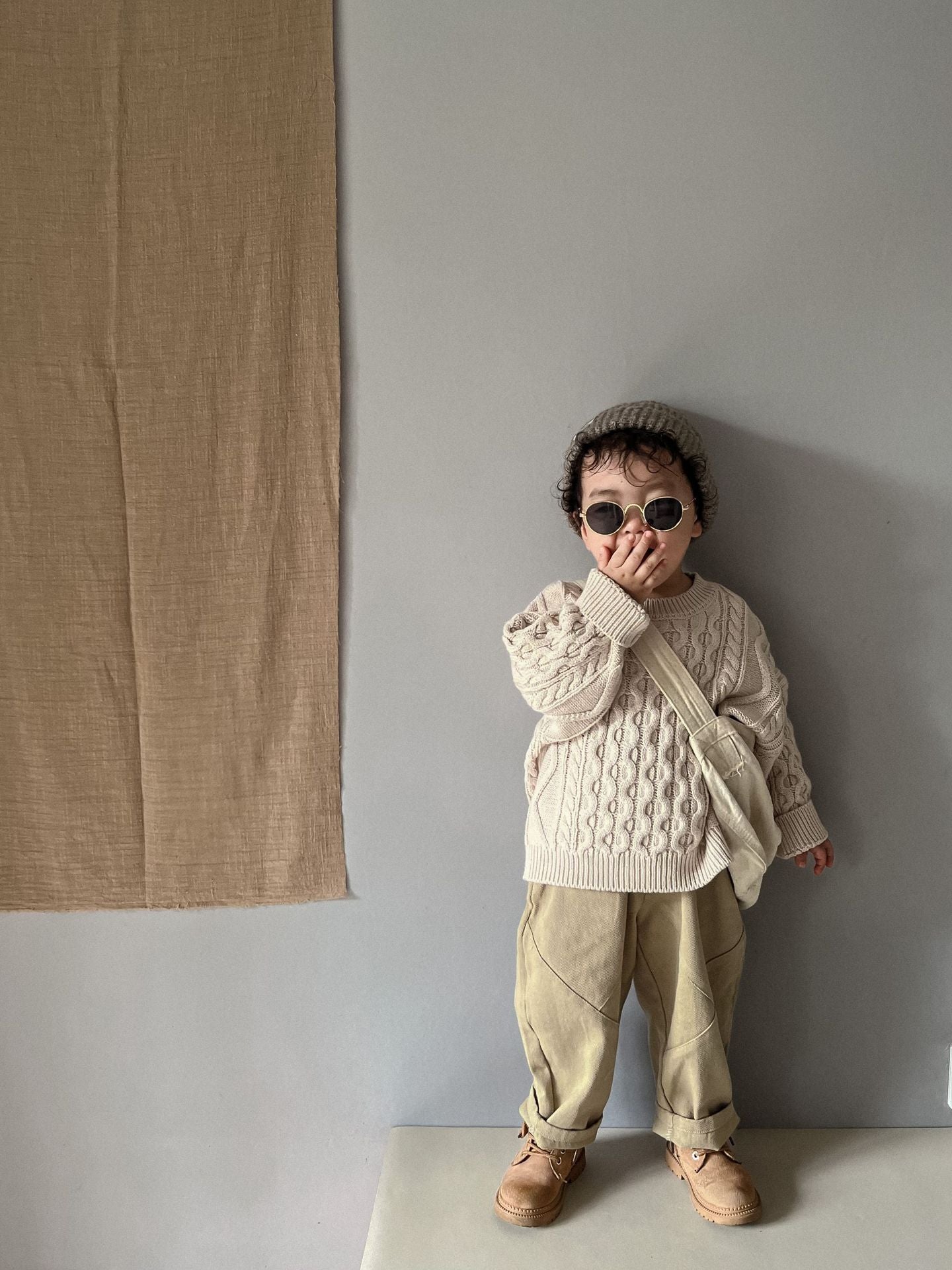 ケーブル編みプルオーバー