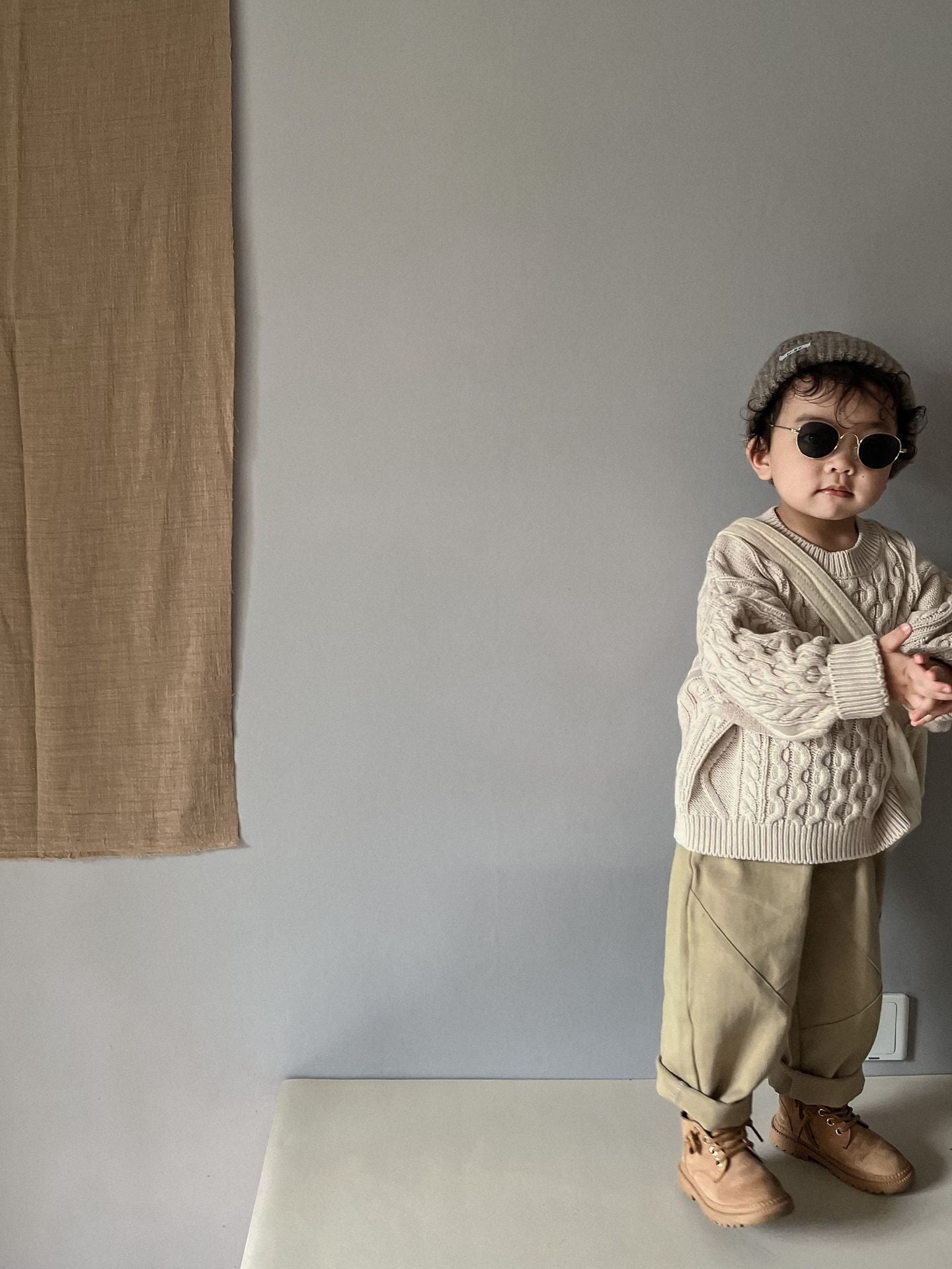 ケーブル編みプルオーバー