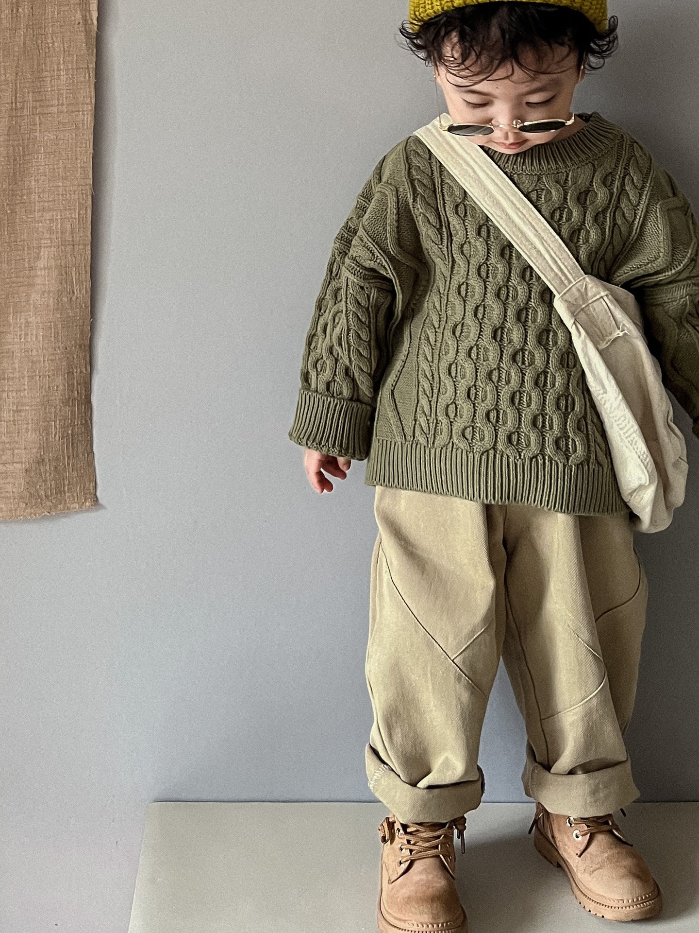 ケーブル編みプルオーバー