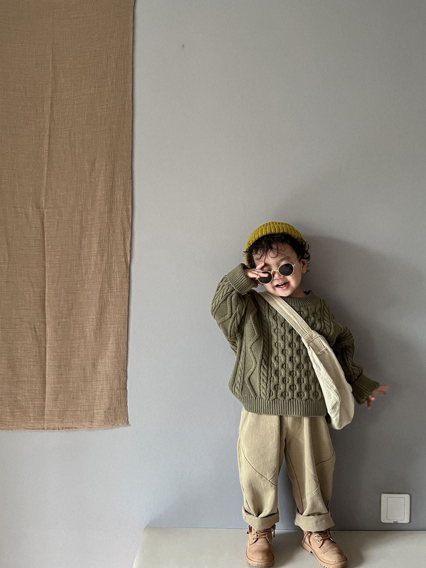 ケーブル編みプルオーバー