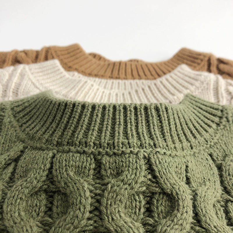 ケーブル編みプルオーバー