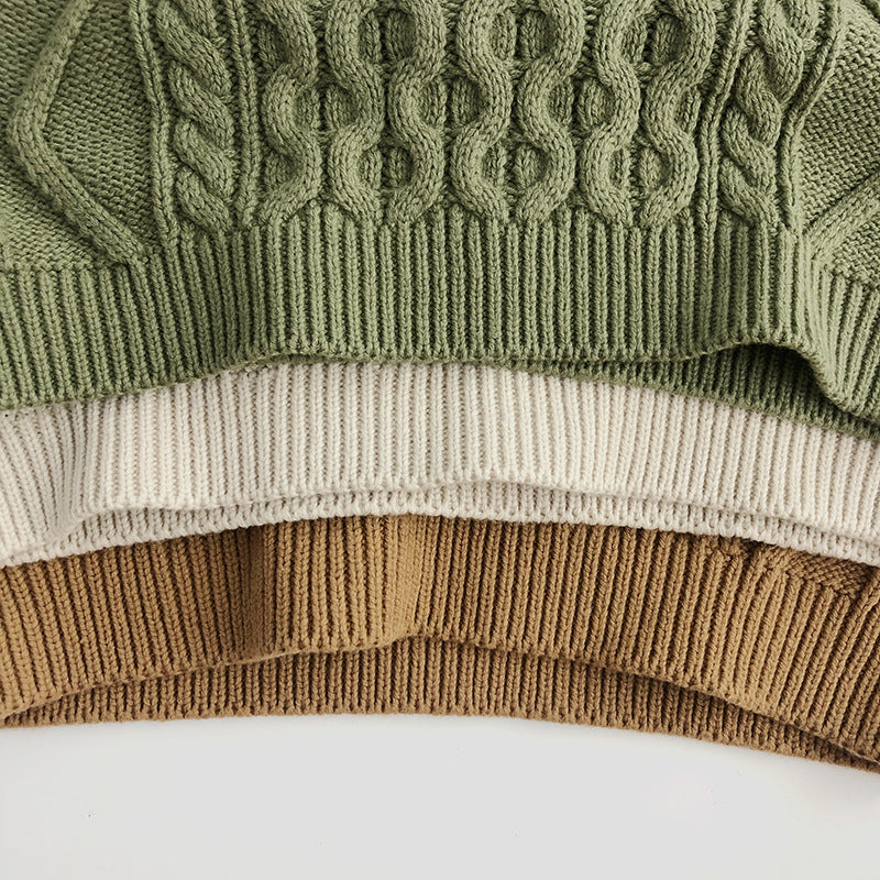 ケーブル編みプルオーバー