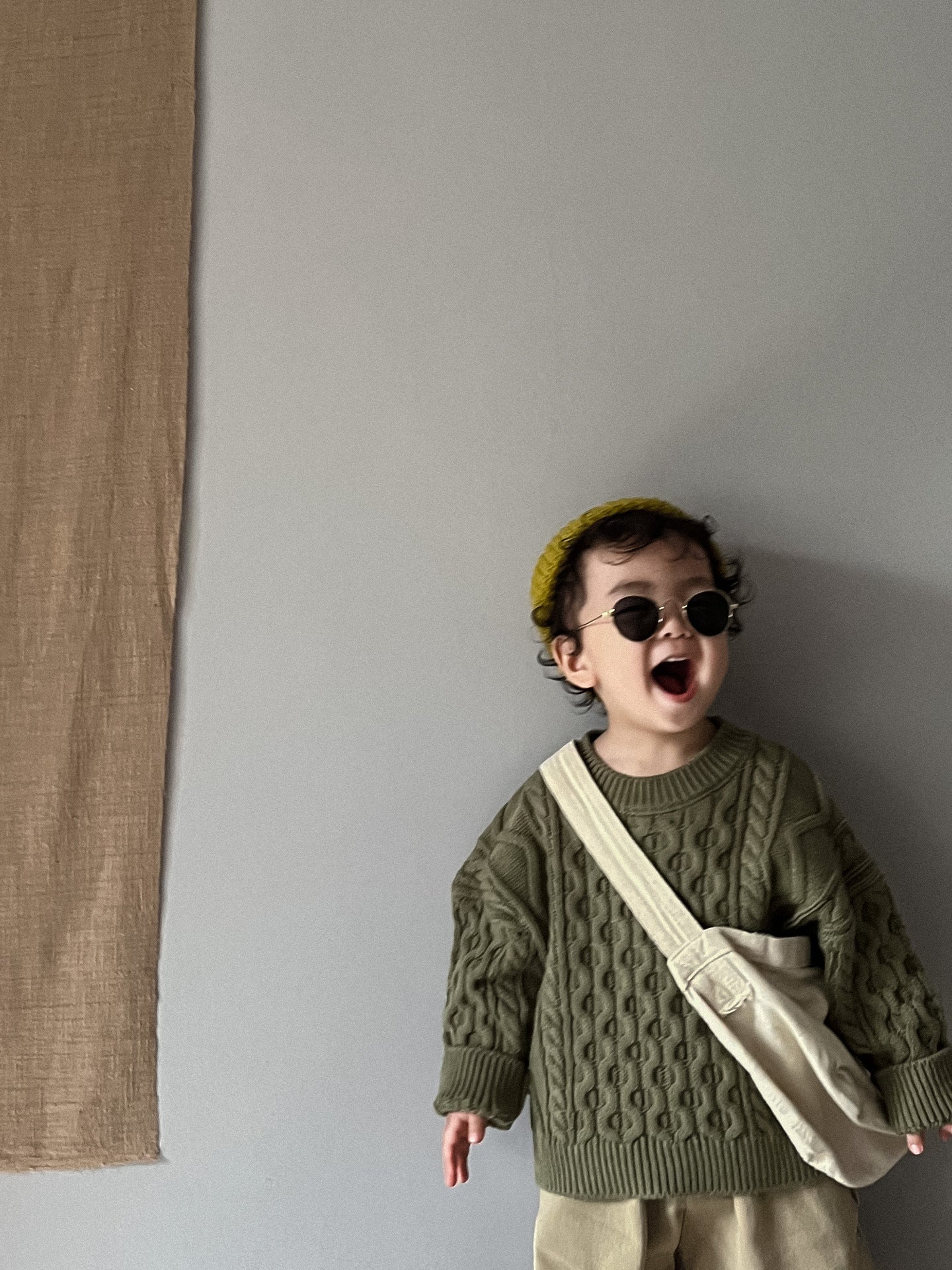 ケーブル編みプルオーバー