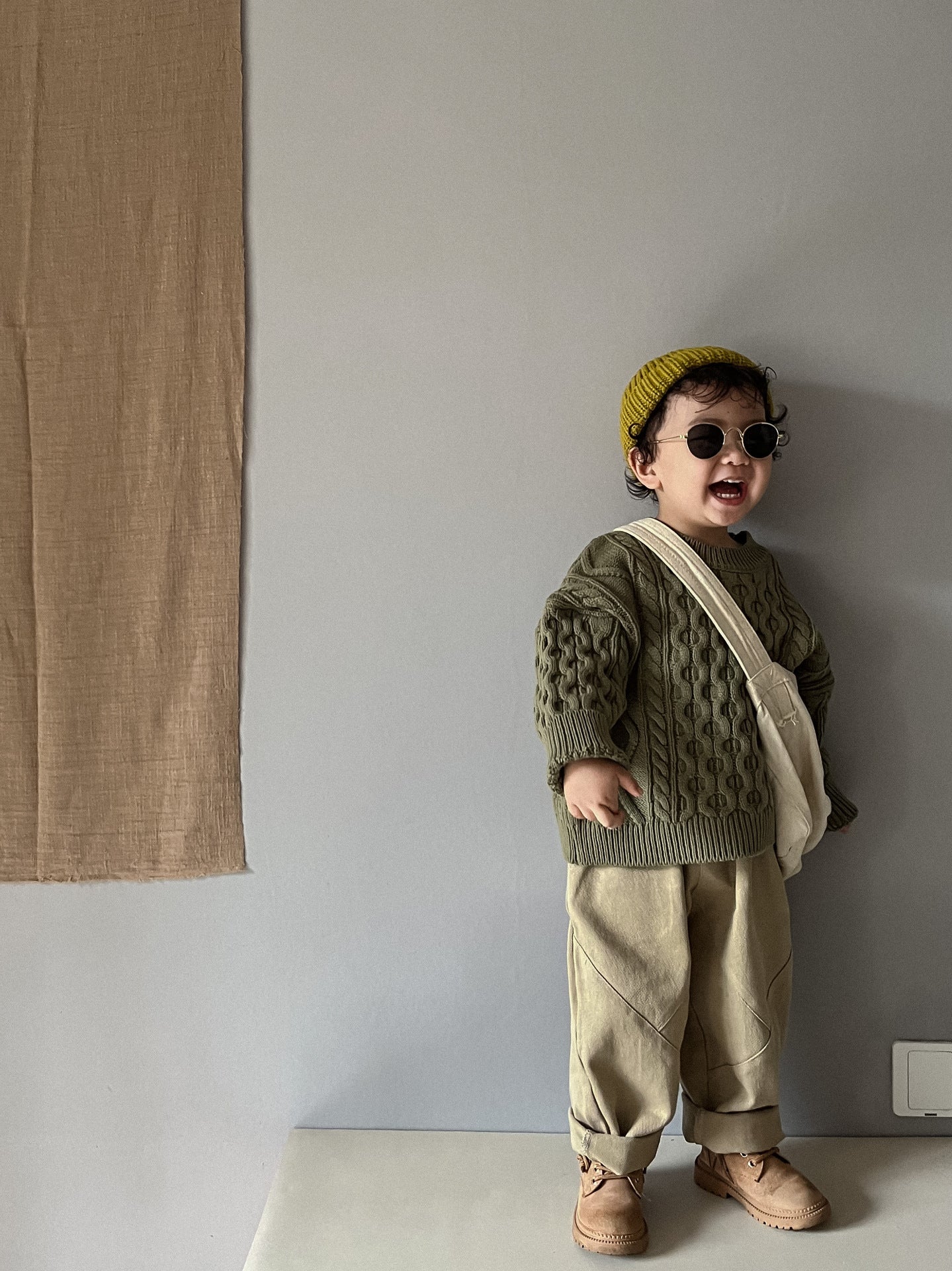 ケーブル編みプルオーバー