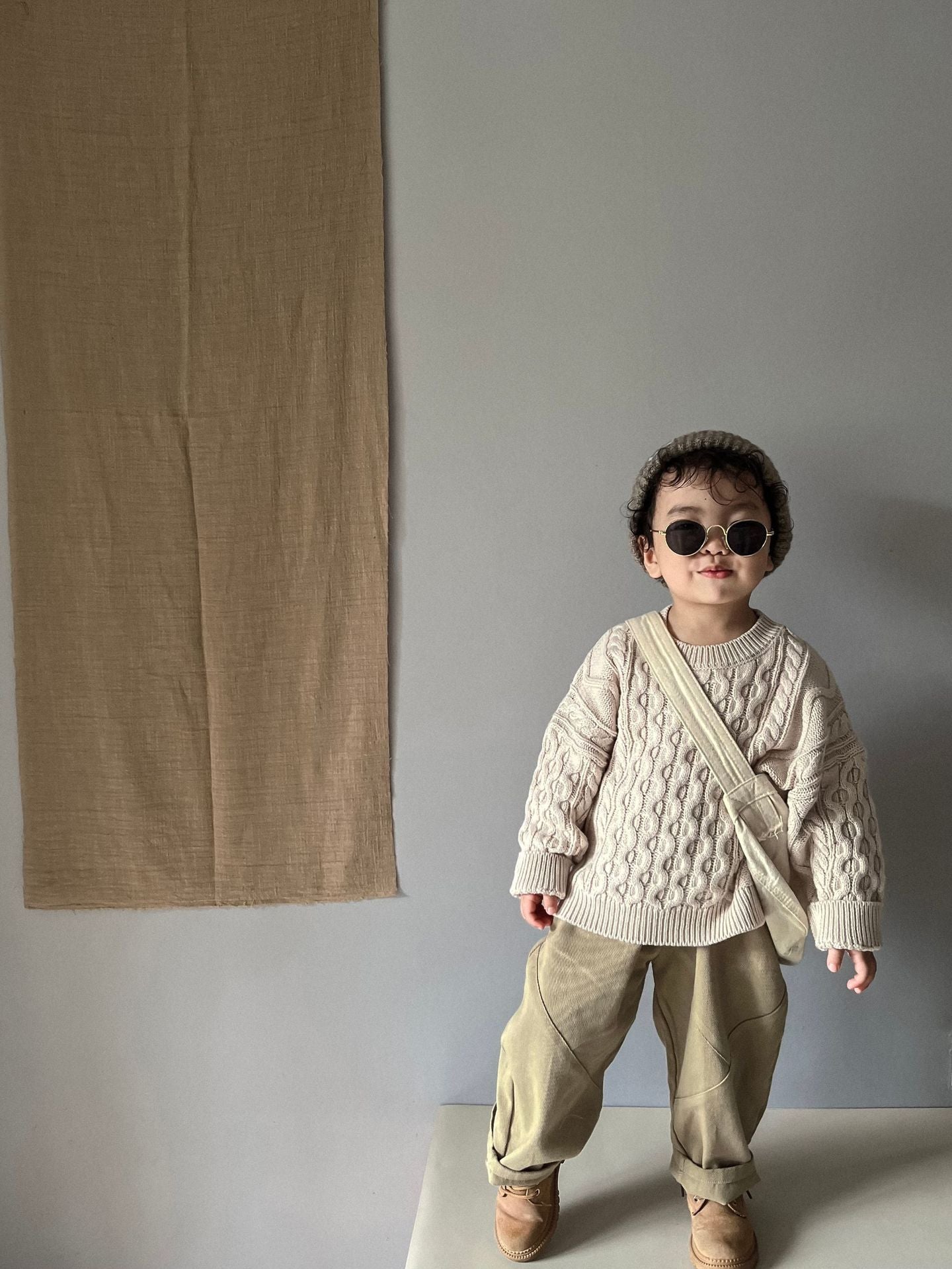 ケーブル編みプルオーバー