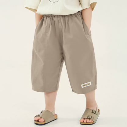裾タグ付き7分丈パンツ