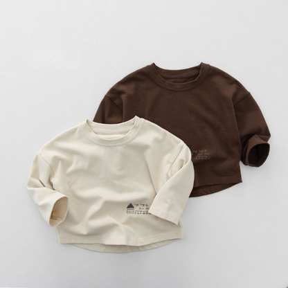 裾プリント長袖Tシャツ