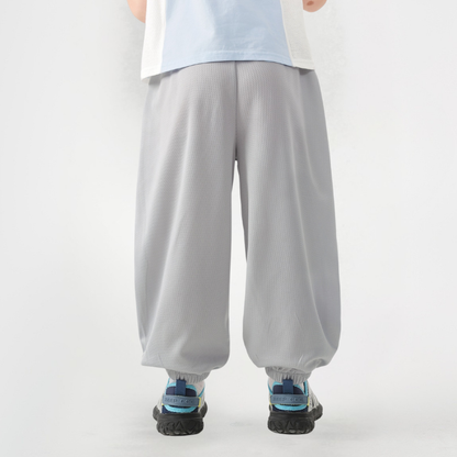 速乾素材ゴム裾スウェットパンツ